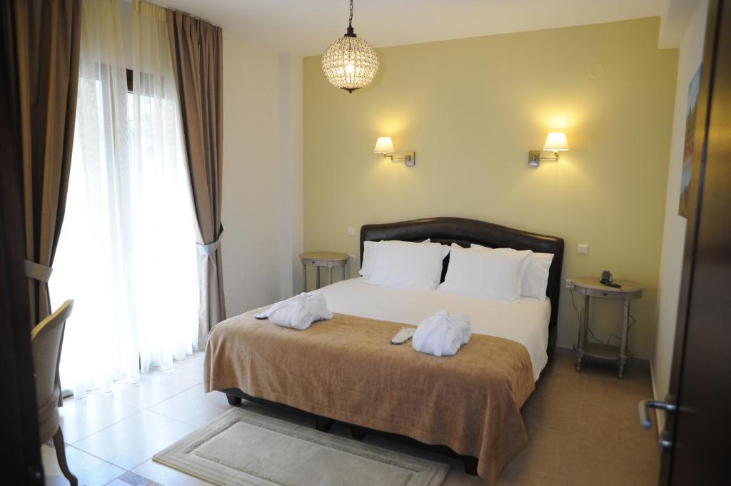 Agapi Luxury Hotel Káto Loutrákion Rom bilde
