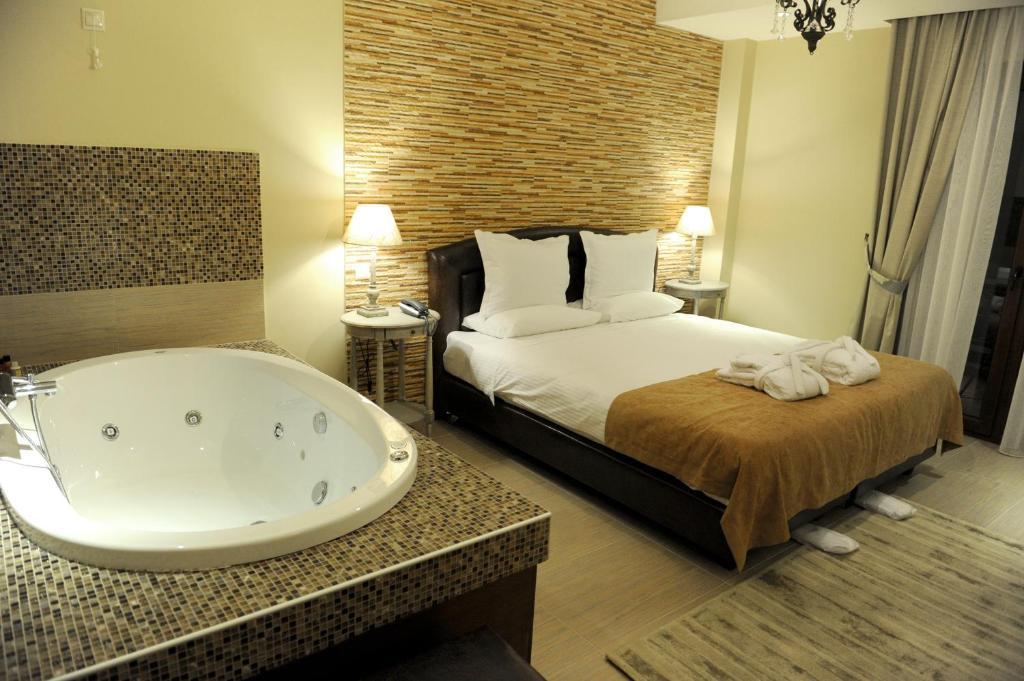 Agapi Luxury Hotel Káto Loutrákion Rom bilde